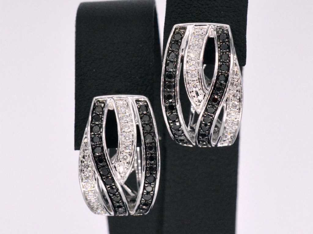 White gold design earrings with white and black diamonds