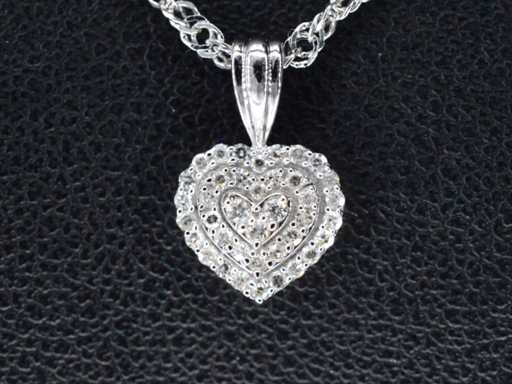 White gold heart shape pendant with diamonds
