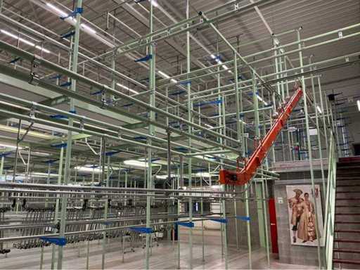 Sistema di trasporto abbigliamento a due livelli a mezzanino con rotaia del tram manuale