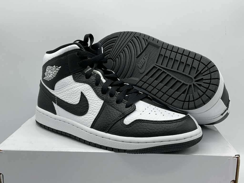 Air jordan 1 best sale noir et blanche femme