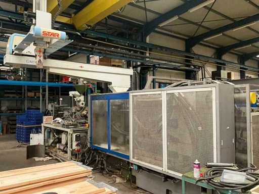 1999 Stork SX-N 4400 - 3500 Machine de moulage par injection avec bras robotique STAR