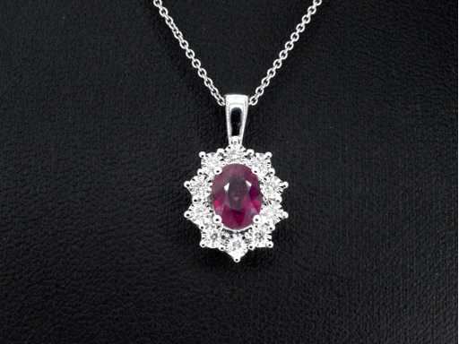 White gold pendant with natural diamonds and ruby