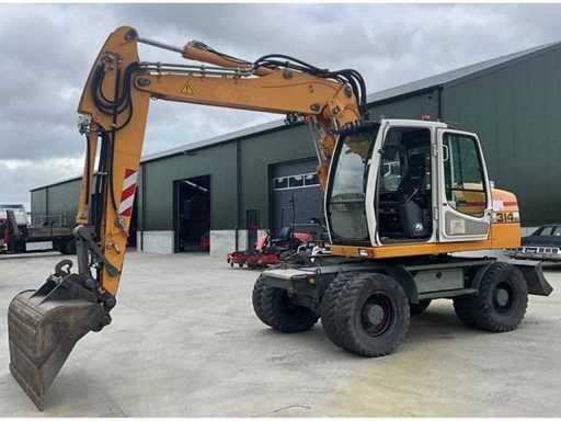 Tower crane, wheel crane, vehicles, forklifts and polder barge in Heerhugowaard