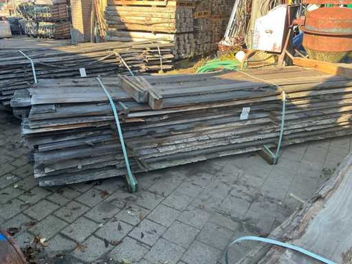 Batch of sawn tree trunk planks oak