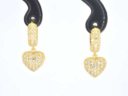 Gold-colored earrings with hanging heart set with brilliants
