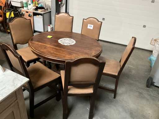 Wooden antique round table with chairs
