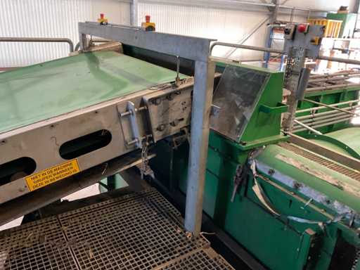 (c) Feed auger cutting machine