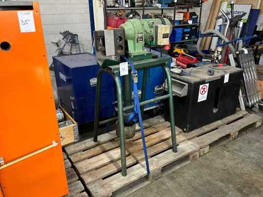 Tube riveting machine