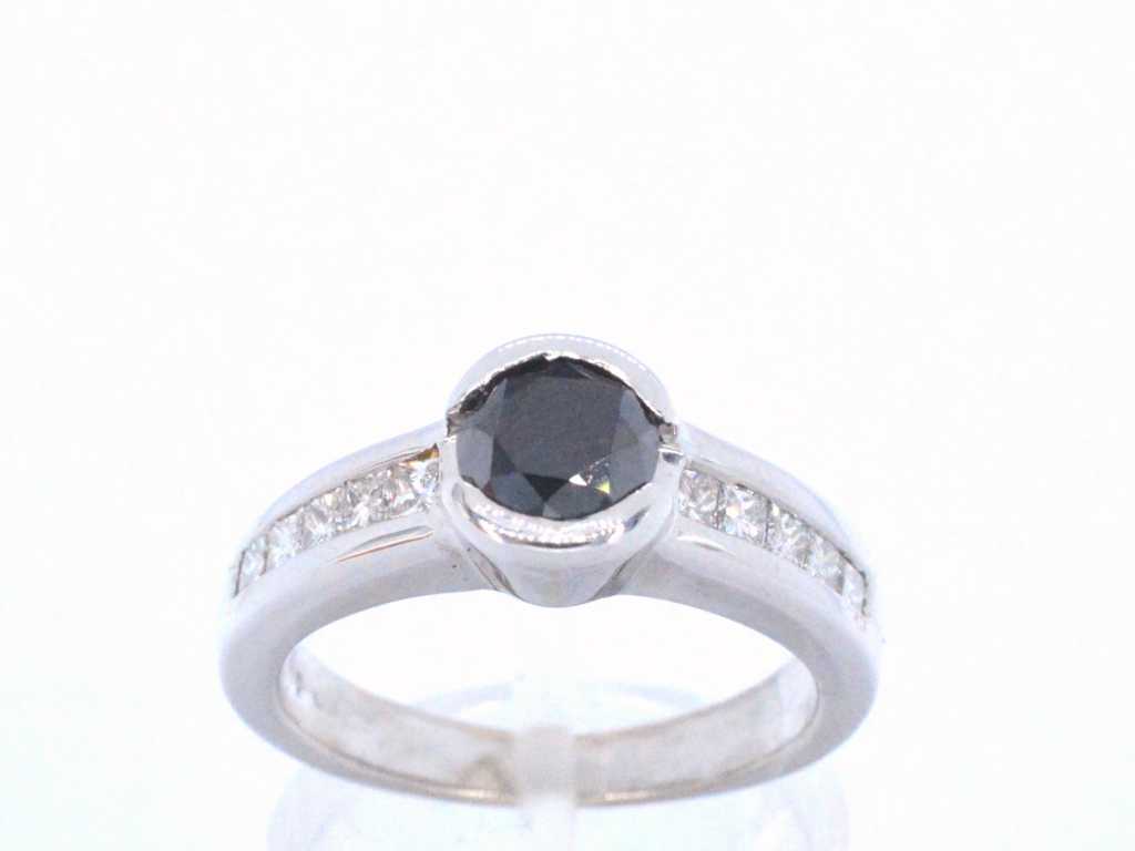 White gold ring with diamonds and a black diamond