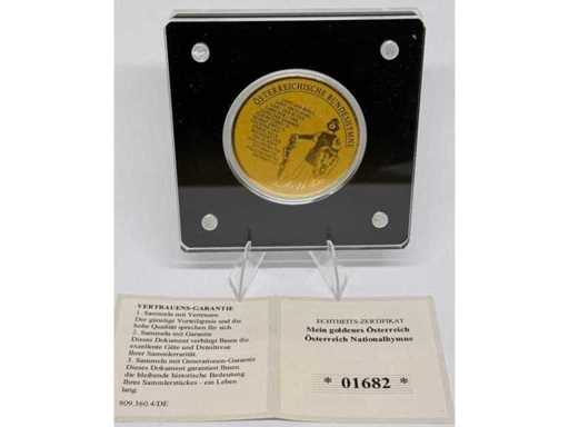 Aur 999 (1/200 oz) – medalia comemorativă a imnului național austriac (Austria), diametru de 40 mm.