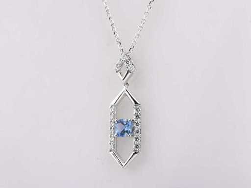 Collana in oro bianco 14 nudi con ciondolo e diamante naturale 0,65 ct e topazio