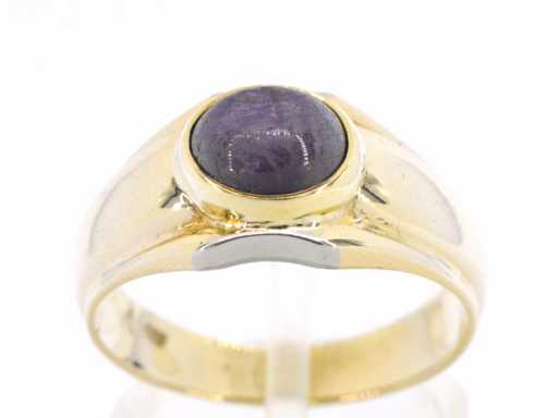 Gold ring with a star ruby