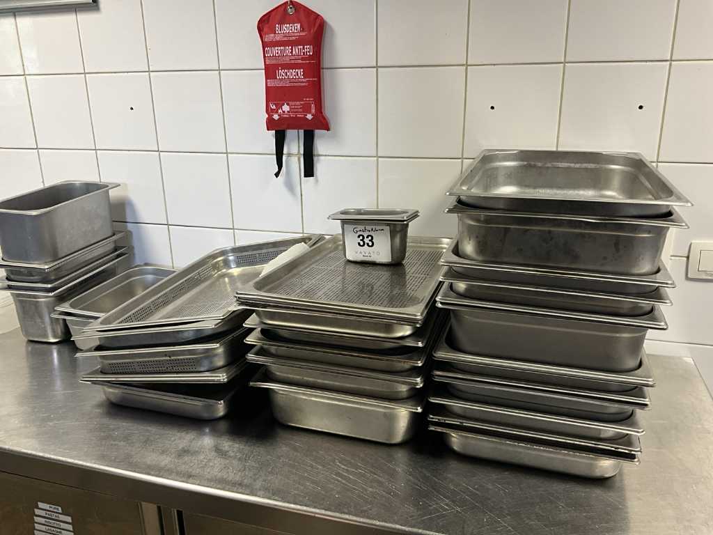 Approx. 69 various stainless steel GastroNorm containers and approx. 22 various plastic ditto