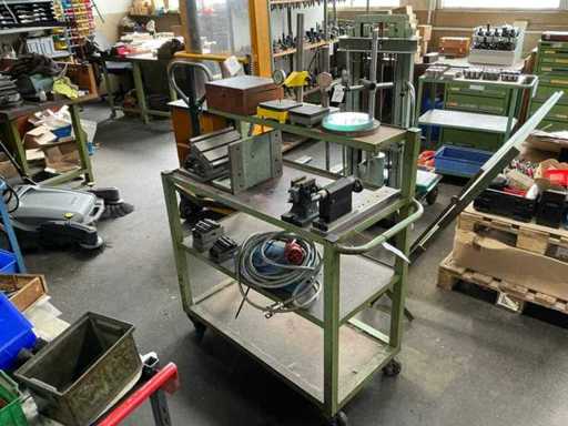 Assortment of various parts including transport trolleys