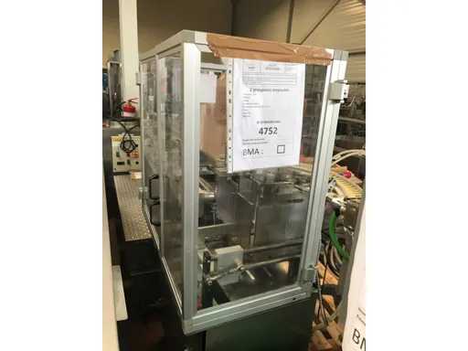 CAM - 1996 - NCK - Conditionneuse d’ampoules