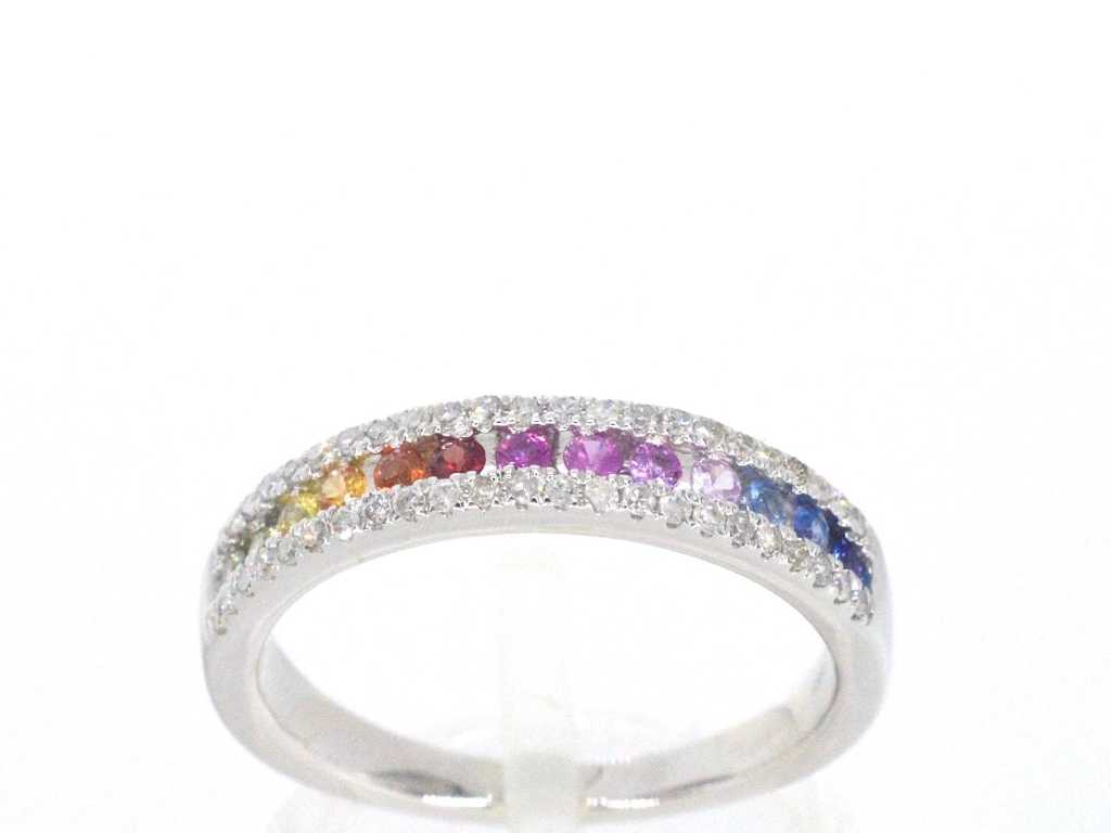 White gold ring with diamonds and multicolor sapphires