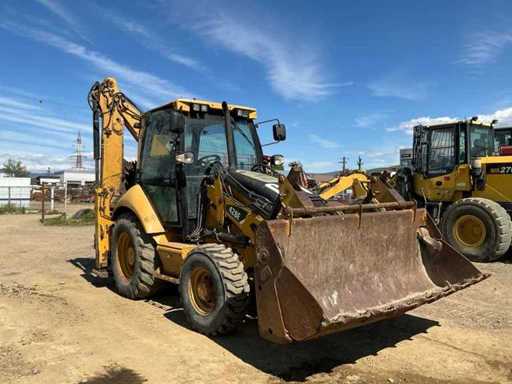 Caterpillar 428E graaflader