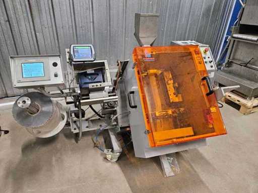 Tecnimodern - Tec20 - Automatyczna, pionowa maszyna do pakowania pochylonego