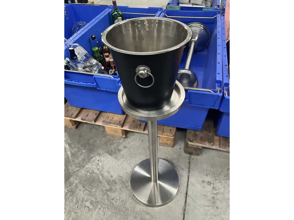 3 various stainless steel ice buckets on stand