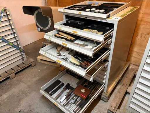 Chest of drawers with measuring tools