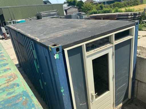 Shipping container with built-in shack