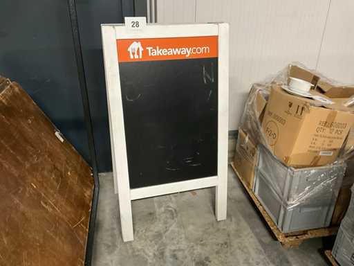 Schild auf dem Bürgersteig