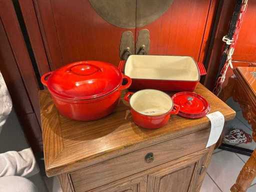 Cast iron cooking pots and baking dish