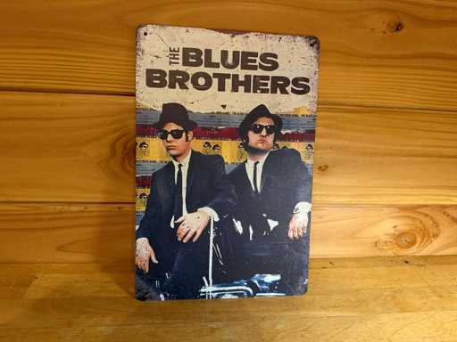 Cartello pubblicitario in metallo