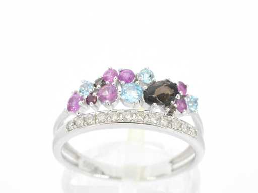 White gold ring with diamonds and gemstones