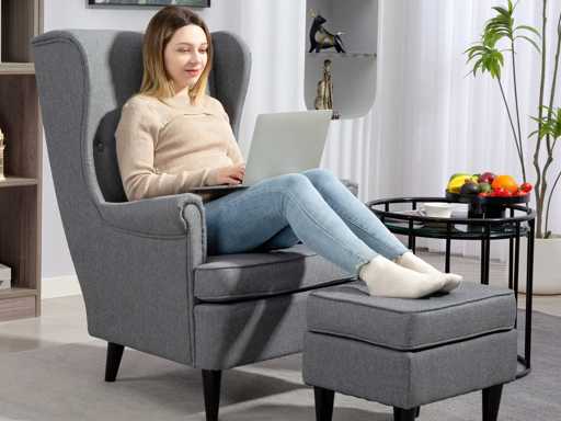 Stoffen loungestoel met poef