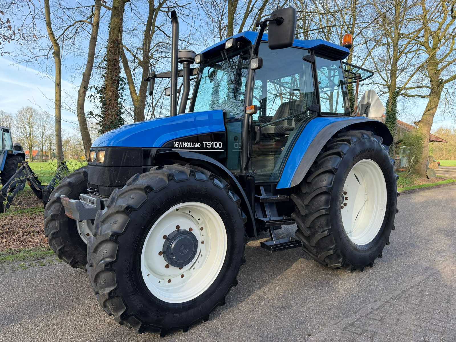 1998 New holland TS 100 All-wheel drive farm tractor