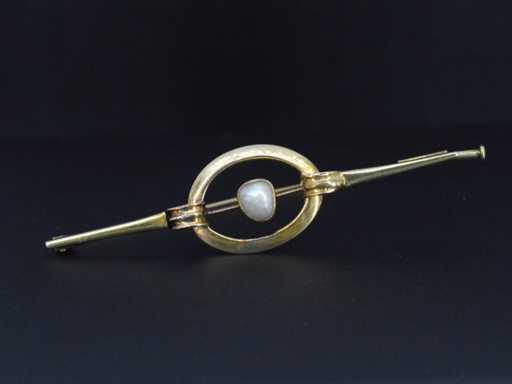 Gouden broche met orient parel