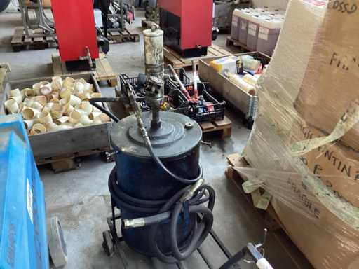 Workshop grease gun on wheels