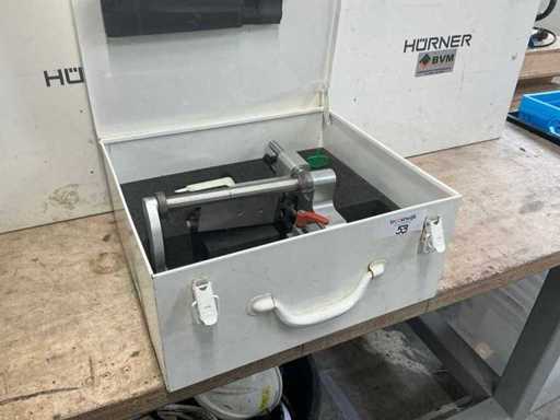 Dispositif de pelage Hürner