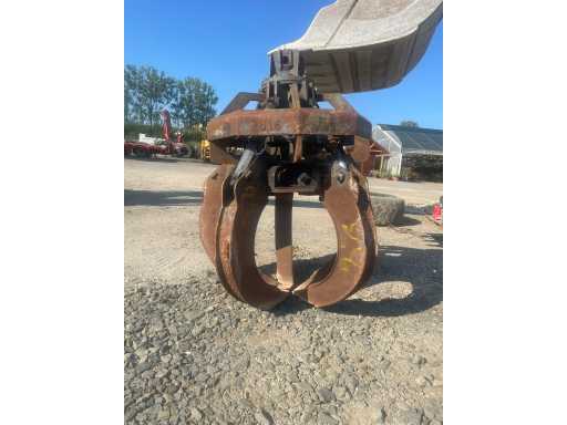 Grapple for loading iron