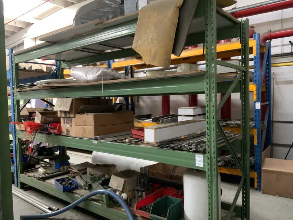 Shelving unit with spare parts for carpet weaving machine
