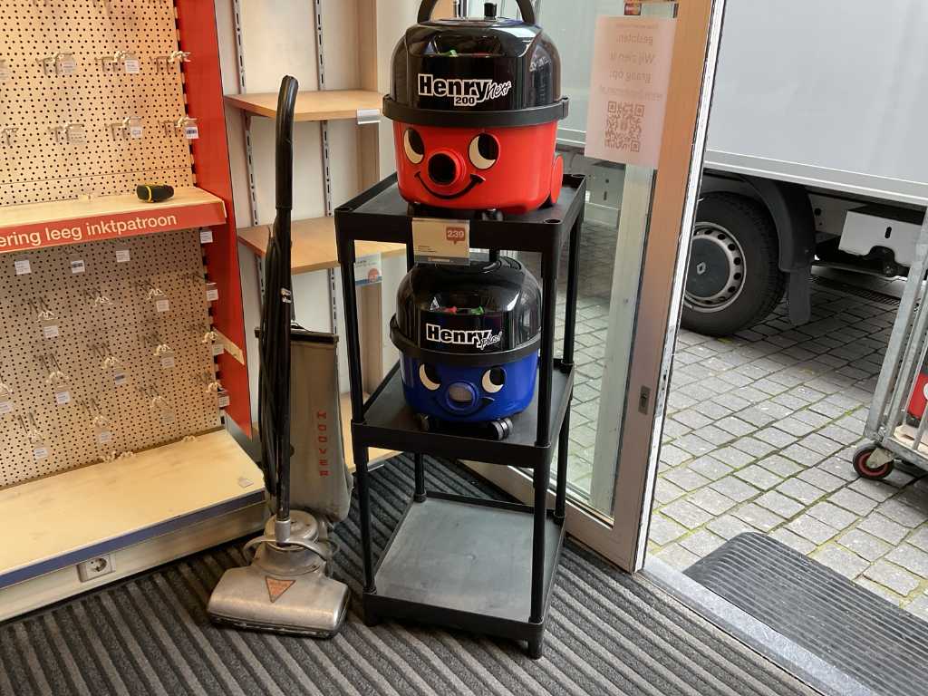 Vacuum cleaner rack with demo vacuum cleaners