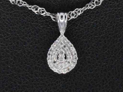 Wisiorek w kształcie kropli z białego złota z diamentami