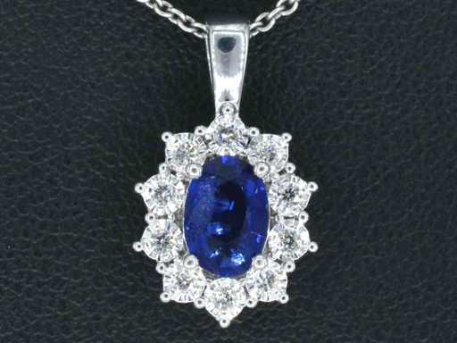 Pendentif d’entourage en or blanc avec diamants et saphir