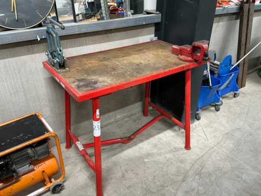Folding work table with vice