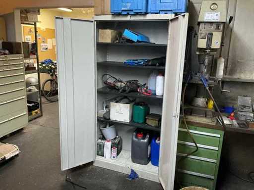 Hinged door cabinet including contents