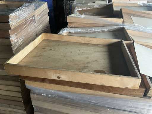 Approximately 100 different wooden trays