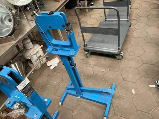 Stretching and bushing machine
