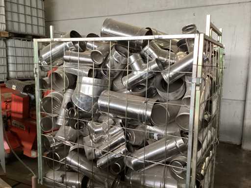 Stainless steel fittings in metal basket