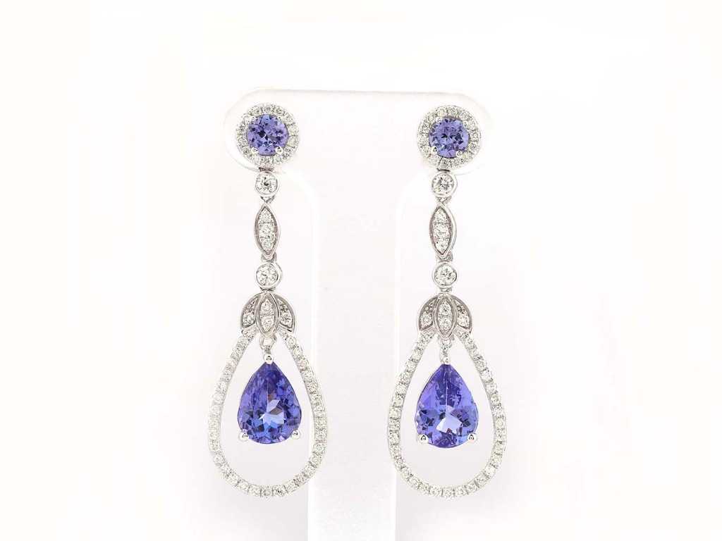 Boucle d’oreille en or blanc 18 carats avec diamant naturel de 0,58 carats et tanzanite