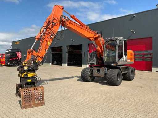 Koparka Hitachi ZX140W-3-kołowa z 2009 roku