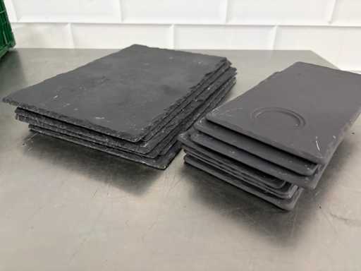 Série de planches de service en ardoise avec divers bols