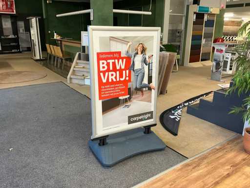 Pavement sign with 2 flags