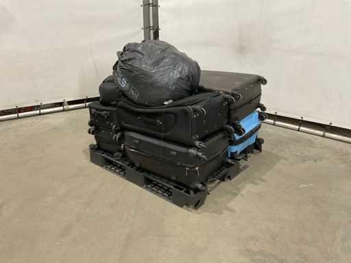 Suitcases and weekend bags with unknown contents