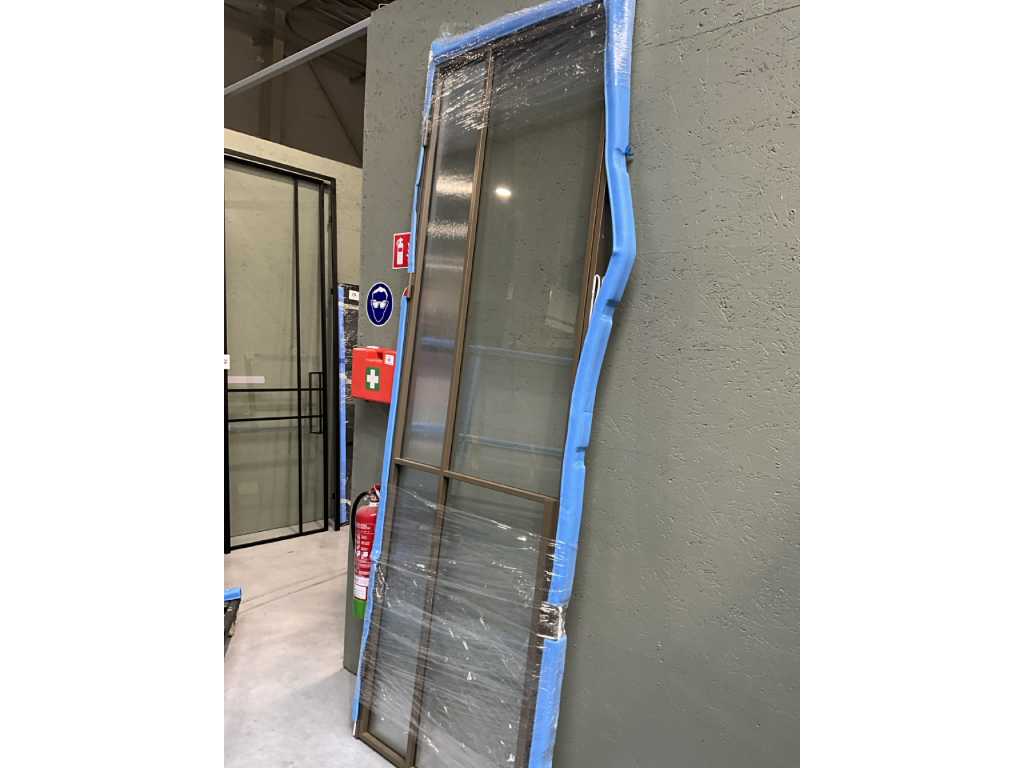 Steel door 895 x 2695 mm.